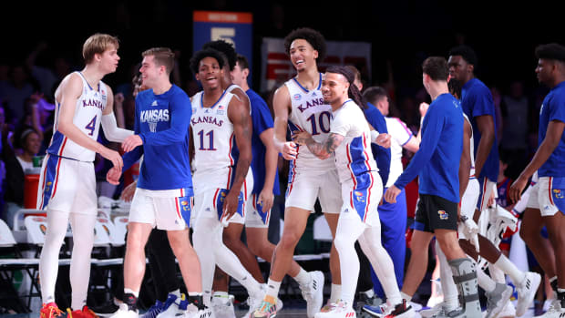 Nov 24, 2022; Paradise Island, BAHAMAS; Kansas Jayhawks guard Bobby Pettiford Jr. (0) celebrates with Kansas Jayhawks forward Jalen Wilson (10) after hitting the game winning shot in overtime against the Wisconsin Badgers at Imperial Arena. Mandatory Credit: Kevin Jairaj-USA TODAY Sports
